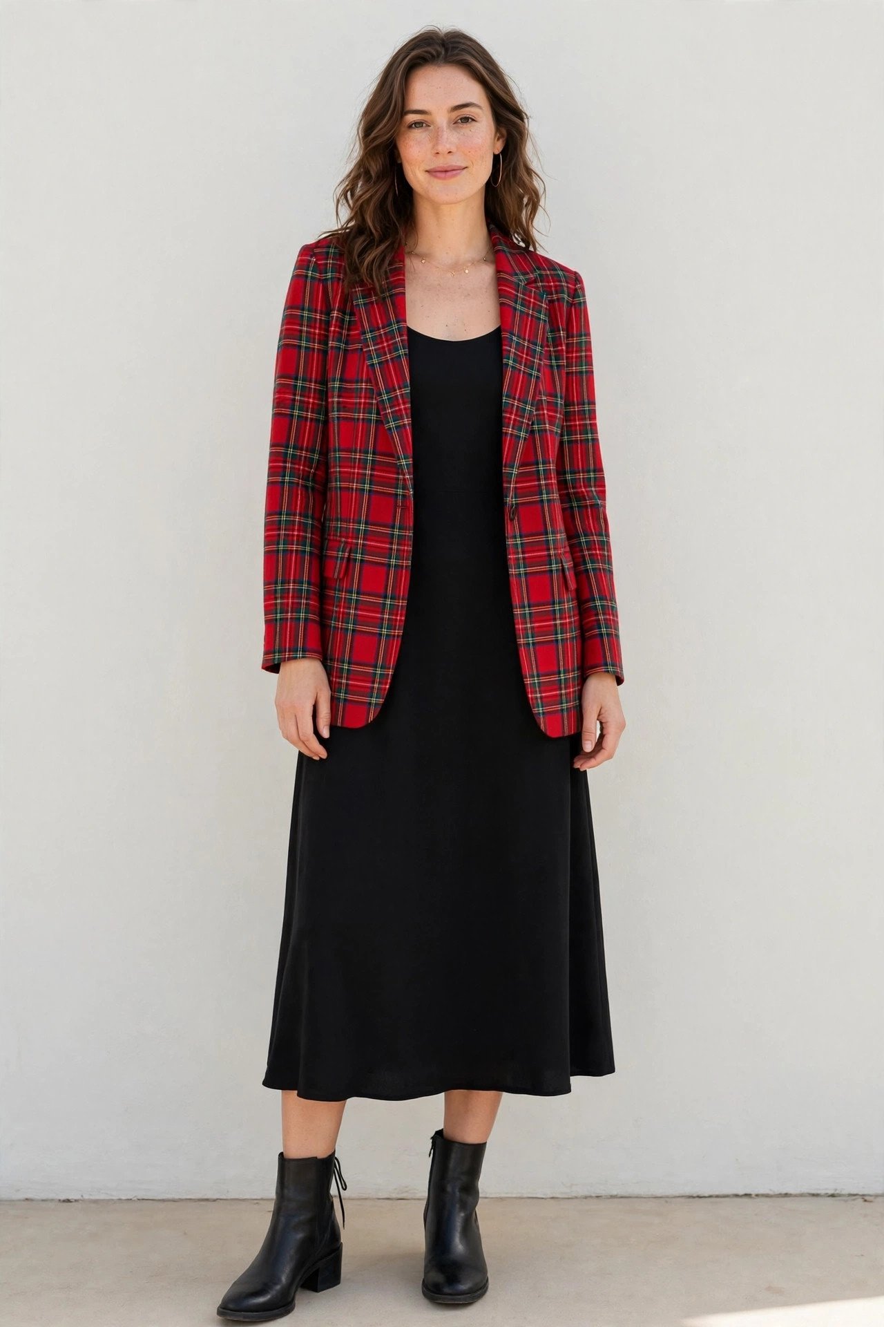 christmas party outfits - tartan blazer over black dress