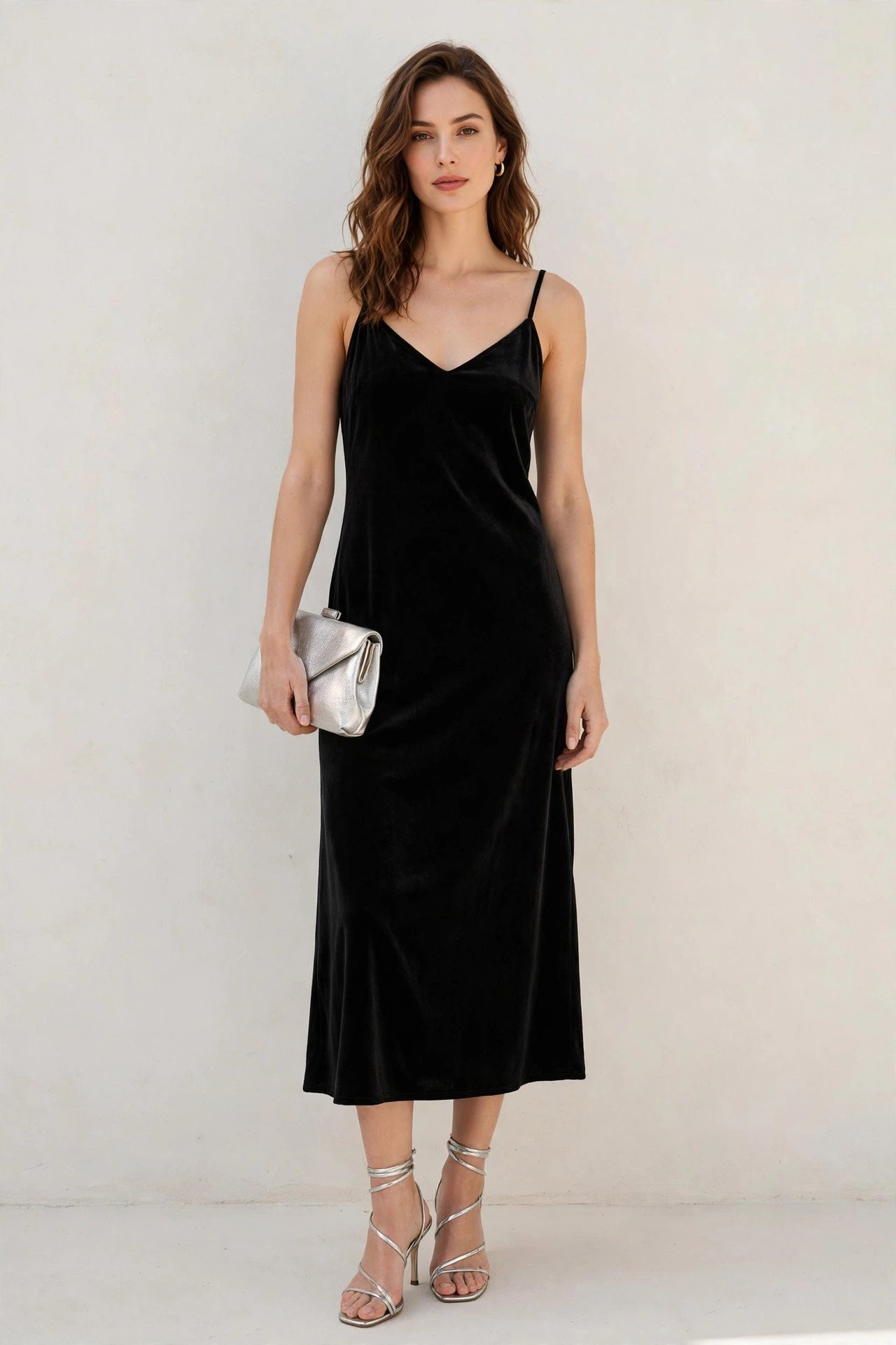 new year's eve outfits - black velvet slip dress with strappy heels
