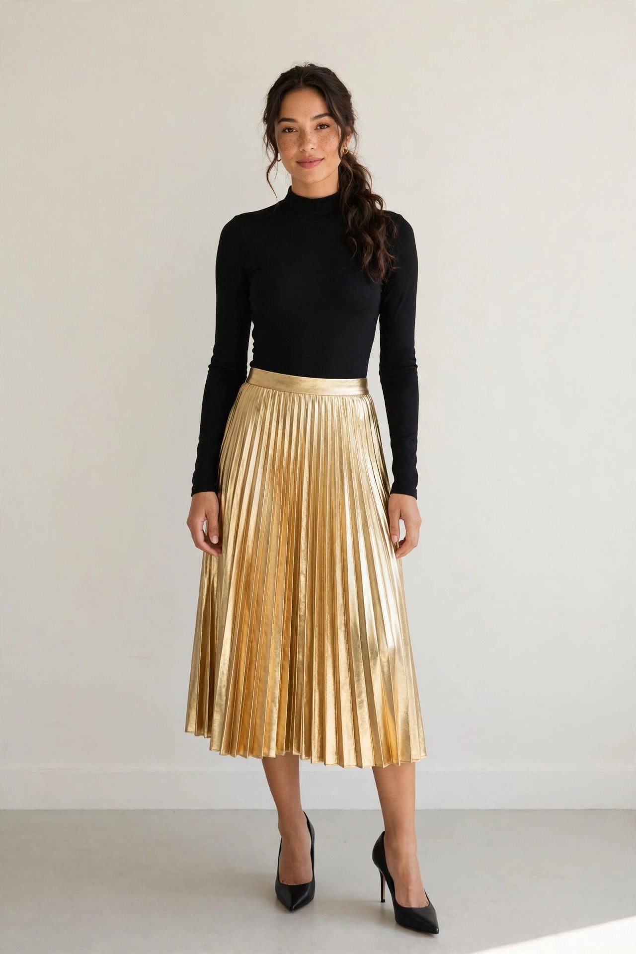 new year's eve outfits - gold metallic pleated skirt with black bodysuit